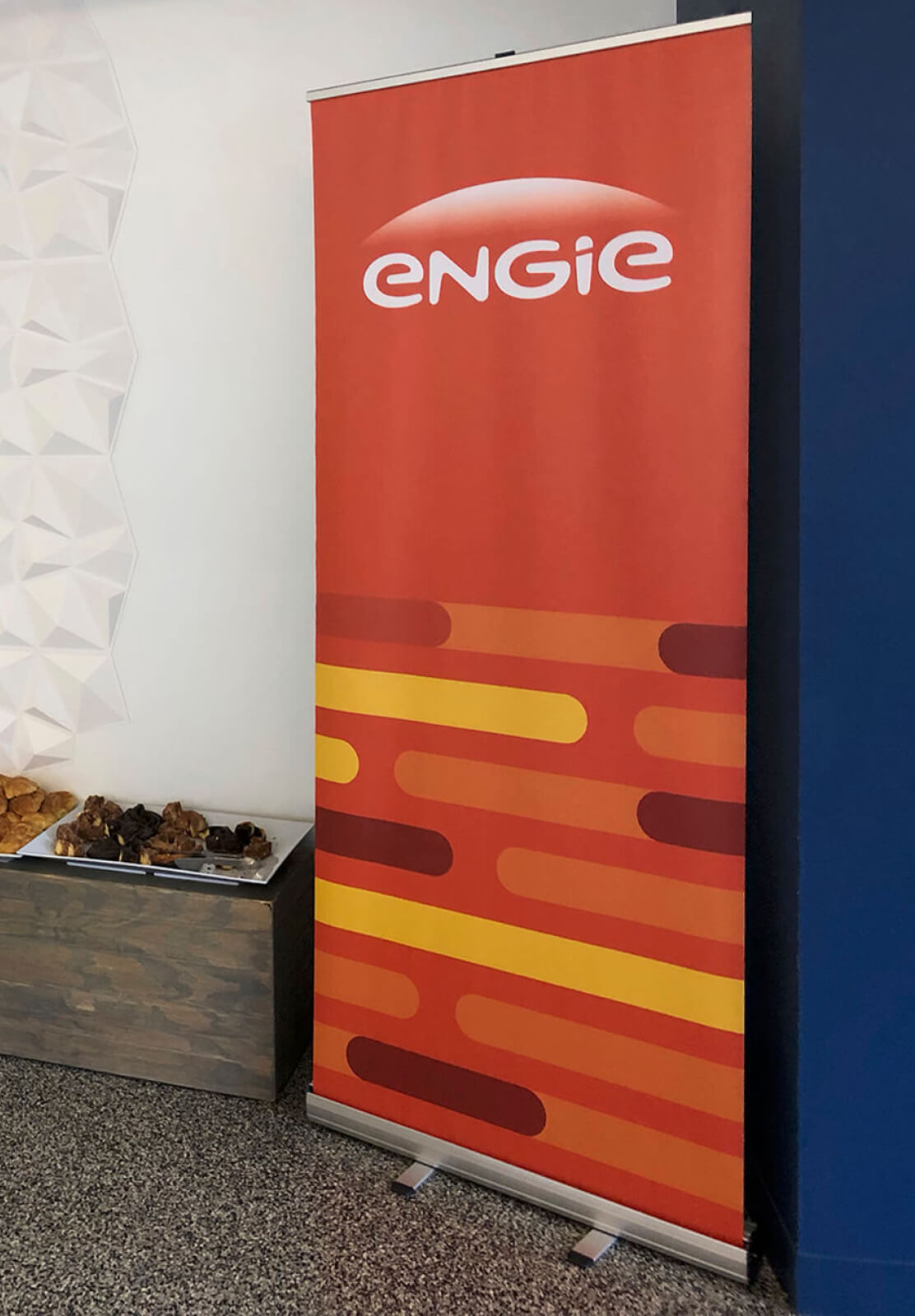 ENGIE orange retractible banner at an event