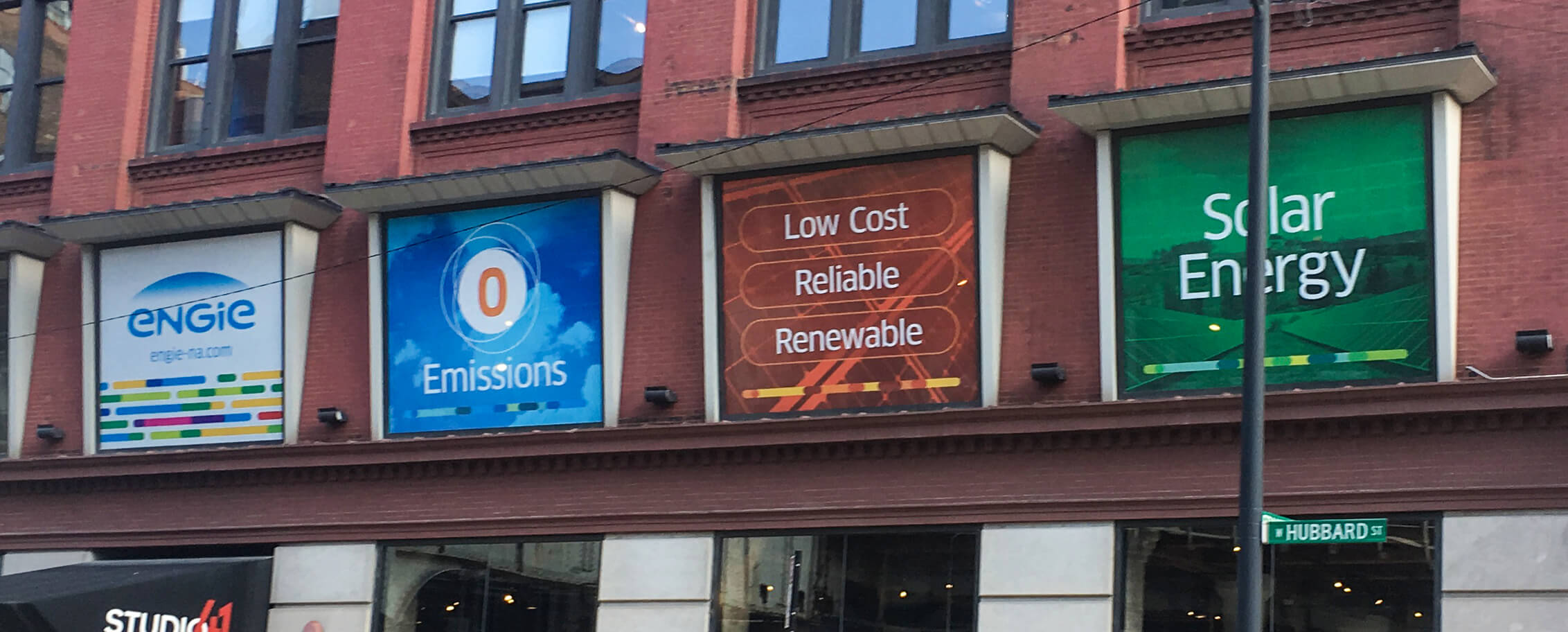 Four window banners on building exterior