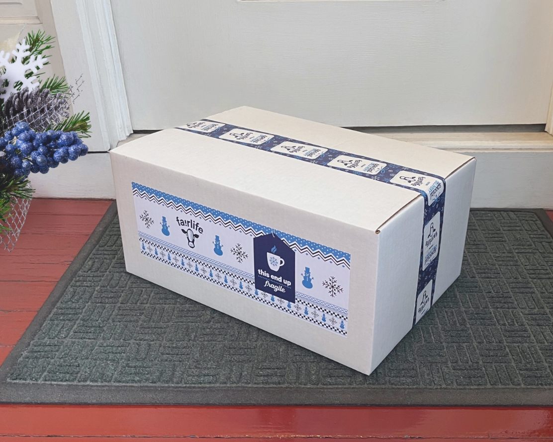 fairlife consumer holiday kit mailing box on front porch near door